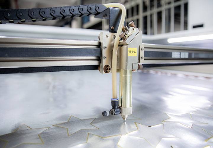 We use a laser cutter to precisely cut the raw material.