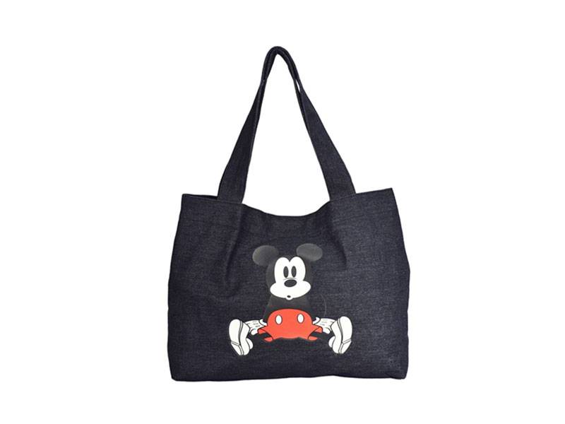 A tote Bag with a mickey pattern on it..
